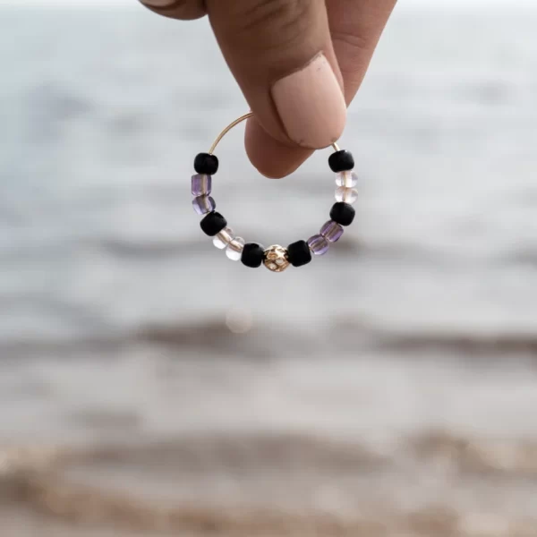 handmade black purple beaded hoop earrings