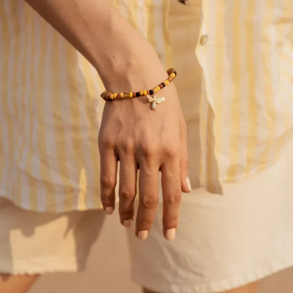 women’s handmade yellow orange brown bead charm bracelet