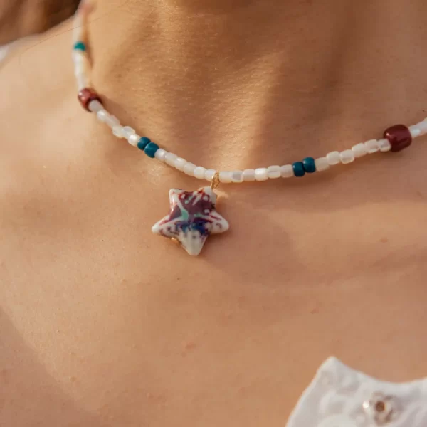 women’s handmade white bead necklace with pendant