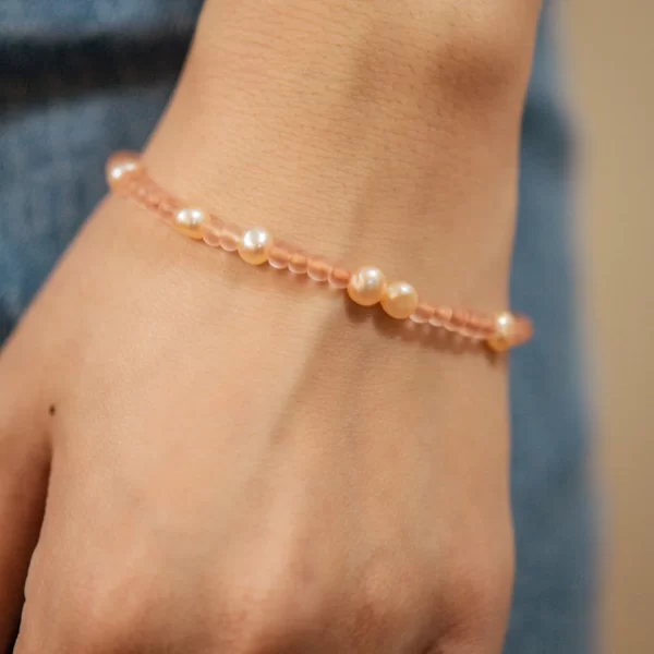 women’s handmade minimal orange pink beaded bracelet