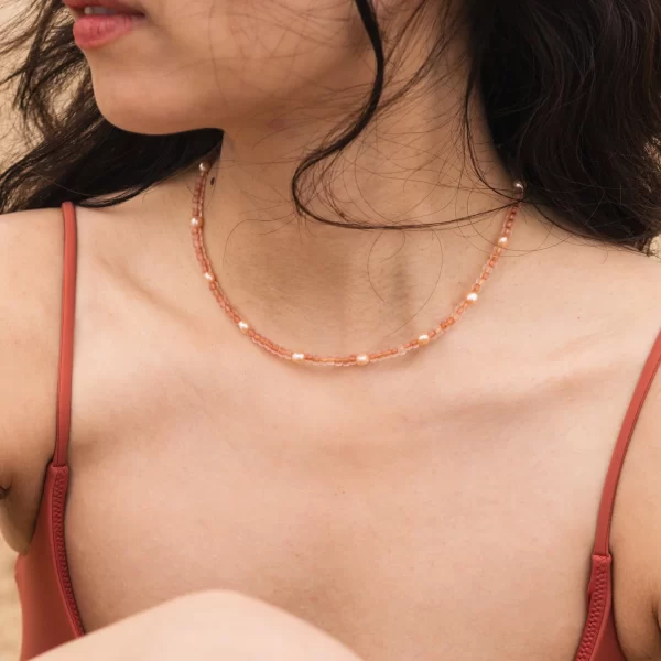 women’s handmade orange pink bead necklace