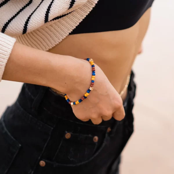 women’s handmade yellow orange brown blue bead bracelet